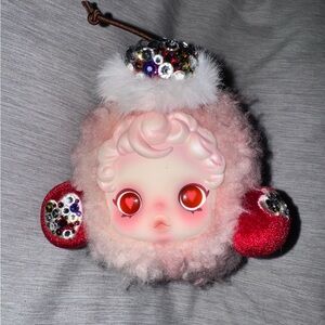 Skullpanda ear phone case embellished with Swarovski crystals